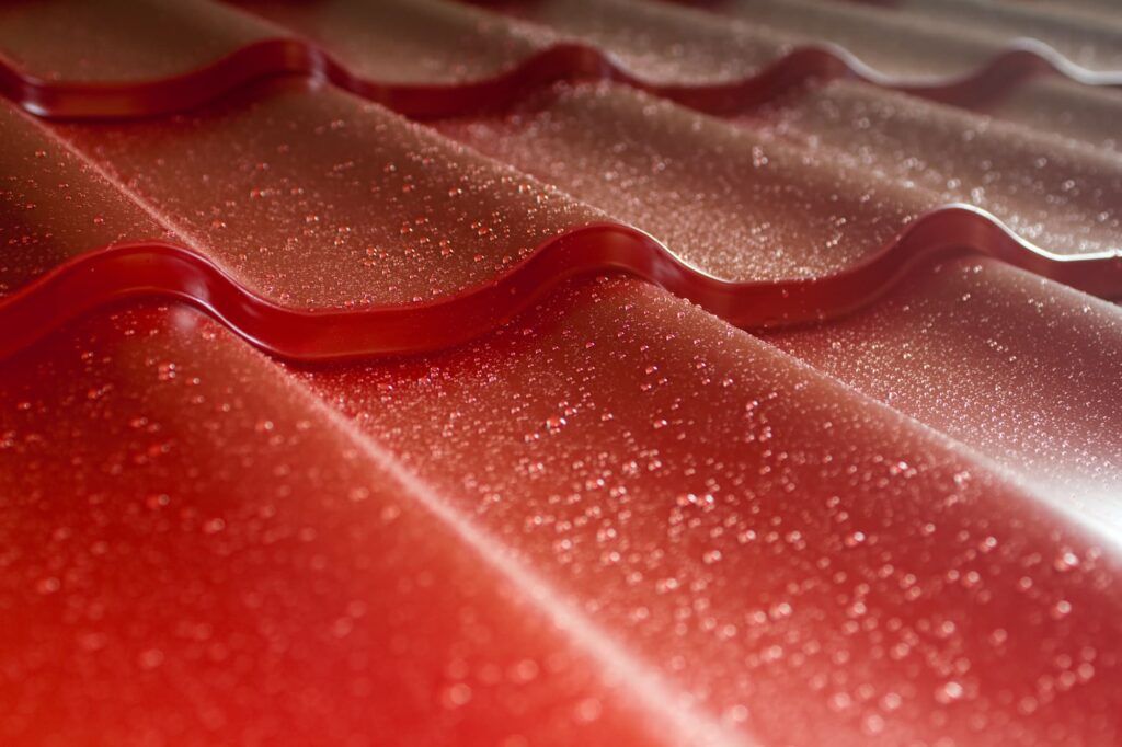 closeup of red metal roof covering